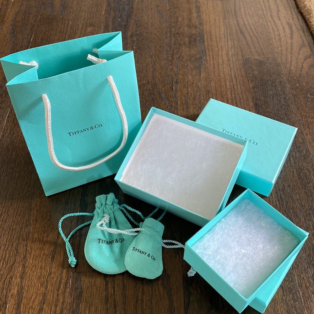 Variety of Tiffany’s boxes, pouches and a bag.